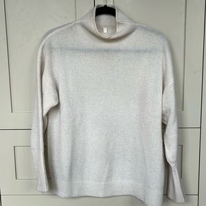 The Group by Babaton
Format Luxe Cashmere Turtleneck